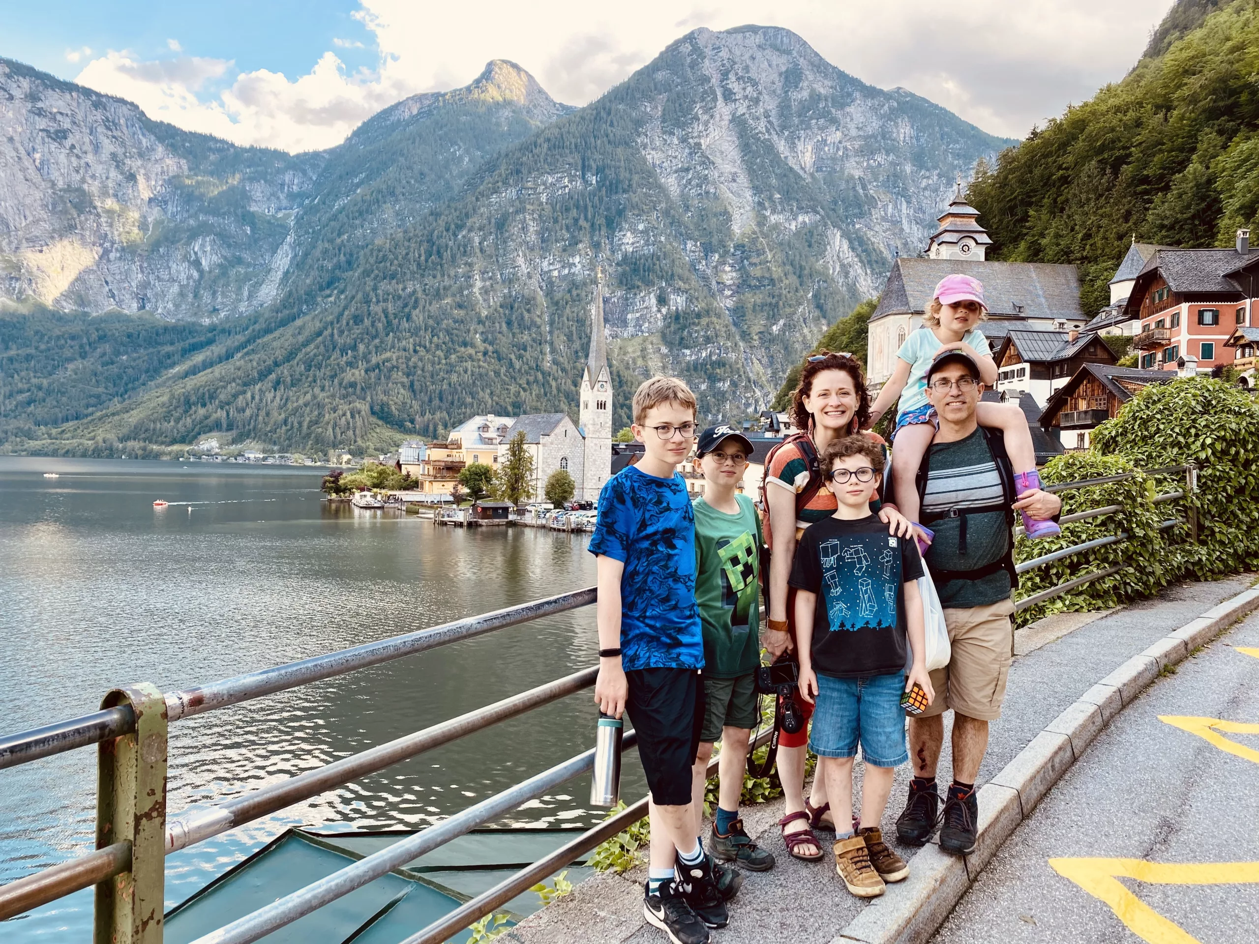 Our family in front of Hallstatt, Austria - the mos instgrammable town in the world
