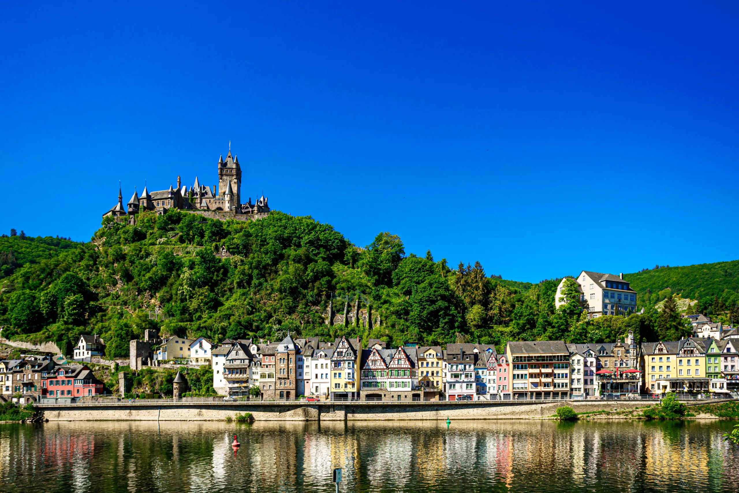 The beautiful town of Cochem, Germany with Reichsburg Cochem Castle looking over it.