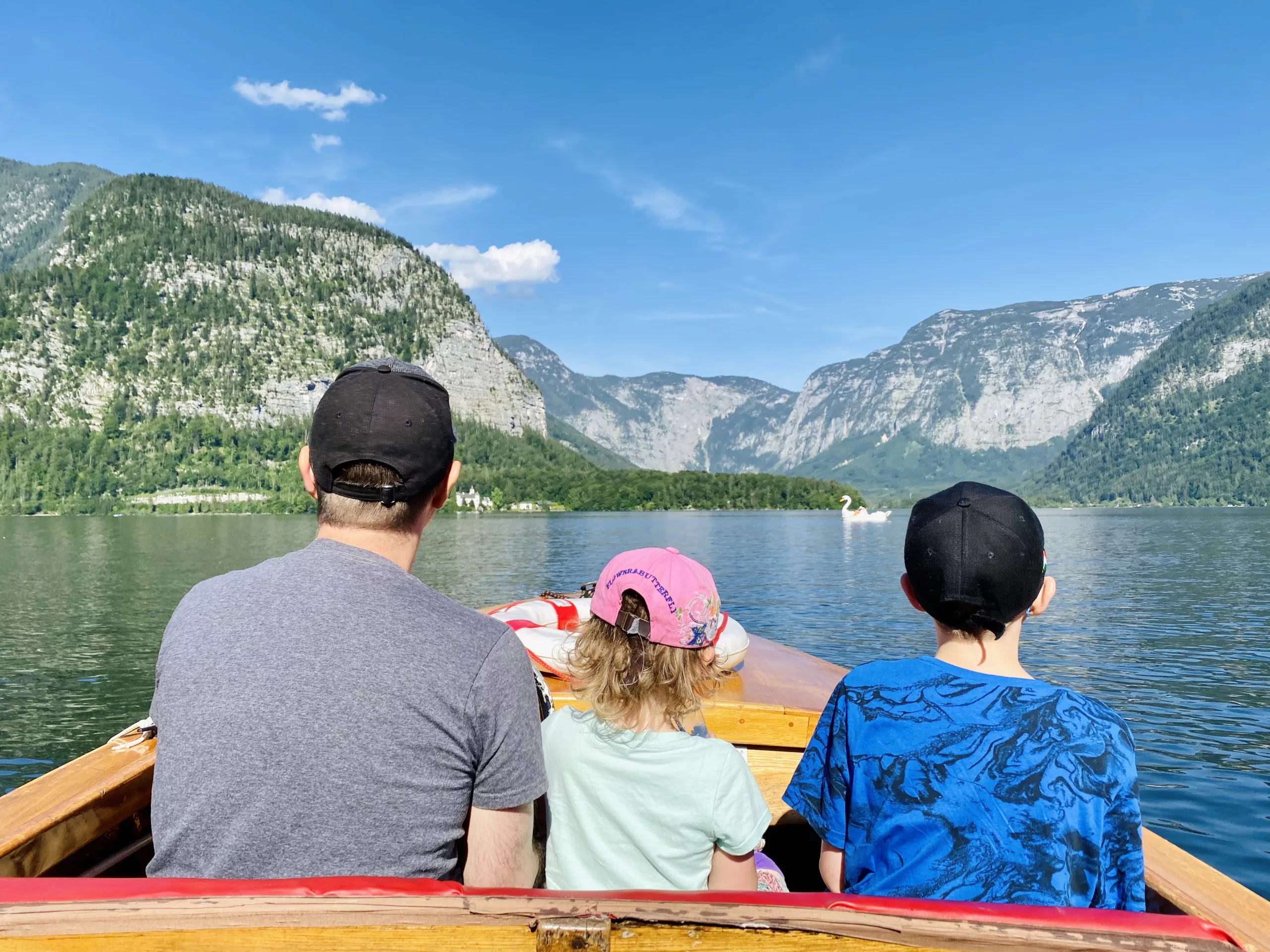 When visiting the village of Hallstatt in Austria, make sure to take a boat ride.